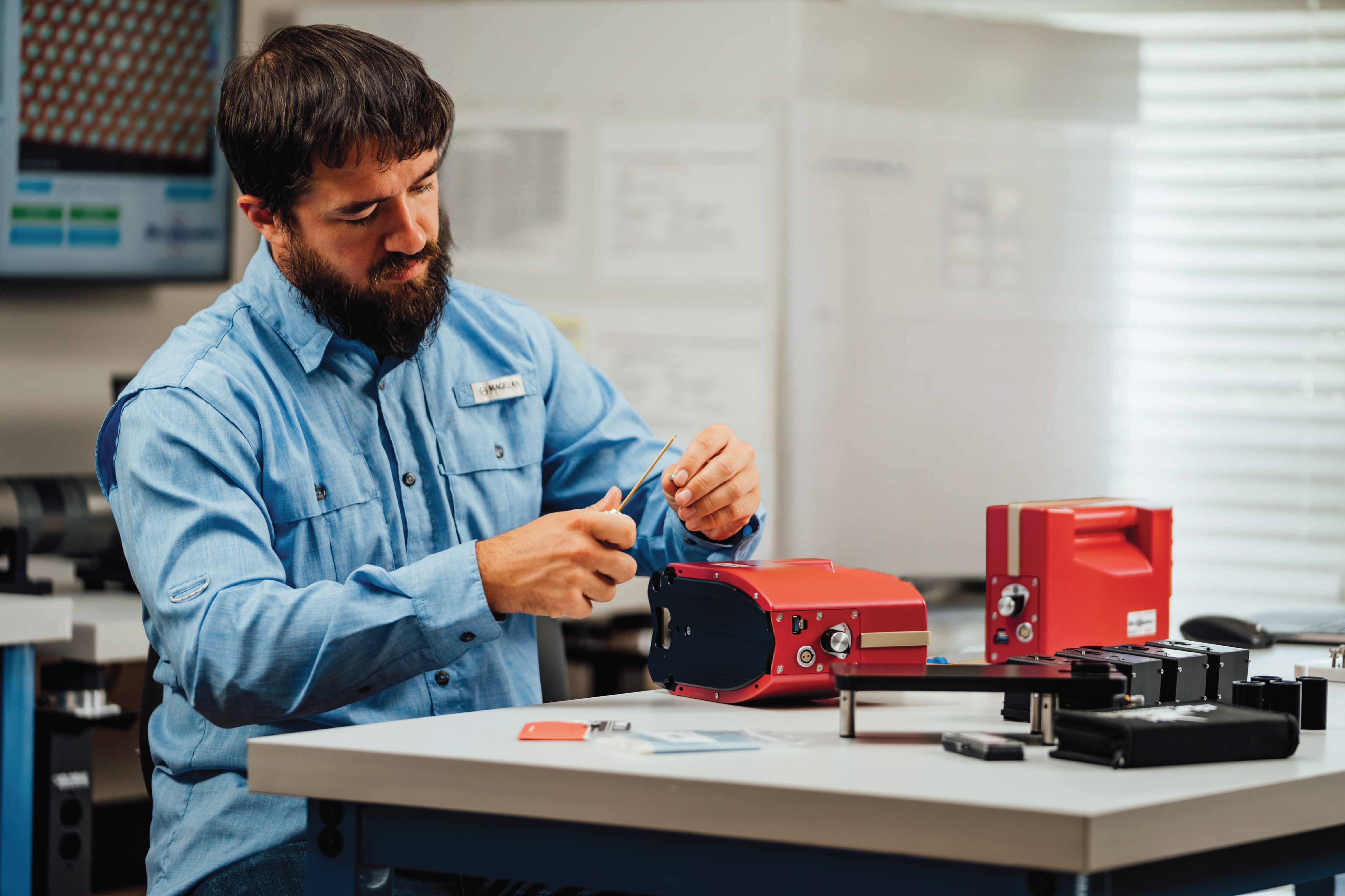 MicroDynamics engineer with precision inspection equipment